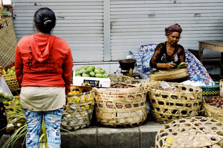 woman selling fruits on focus photography